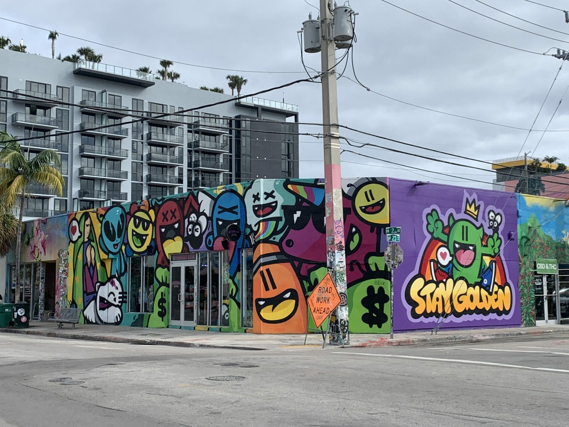 Vibrant street mural in Wynwood, Florida, showcasing colorful artwork on urban walls. This corner is super colorful!