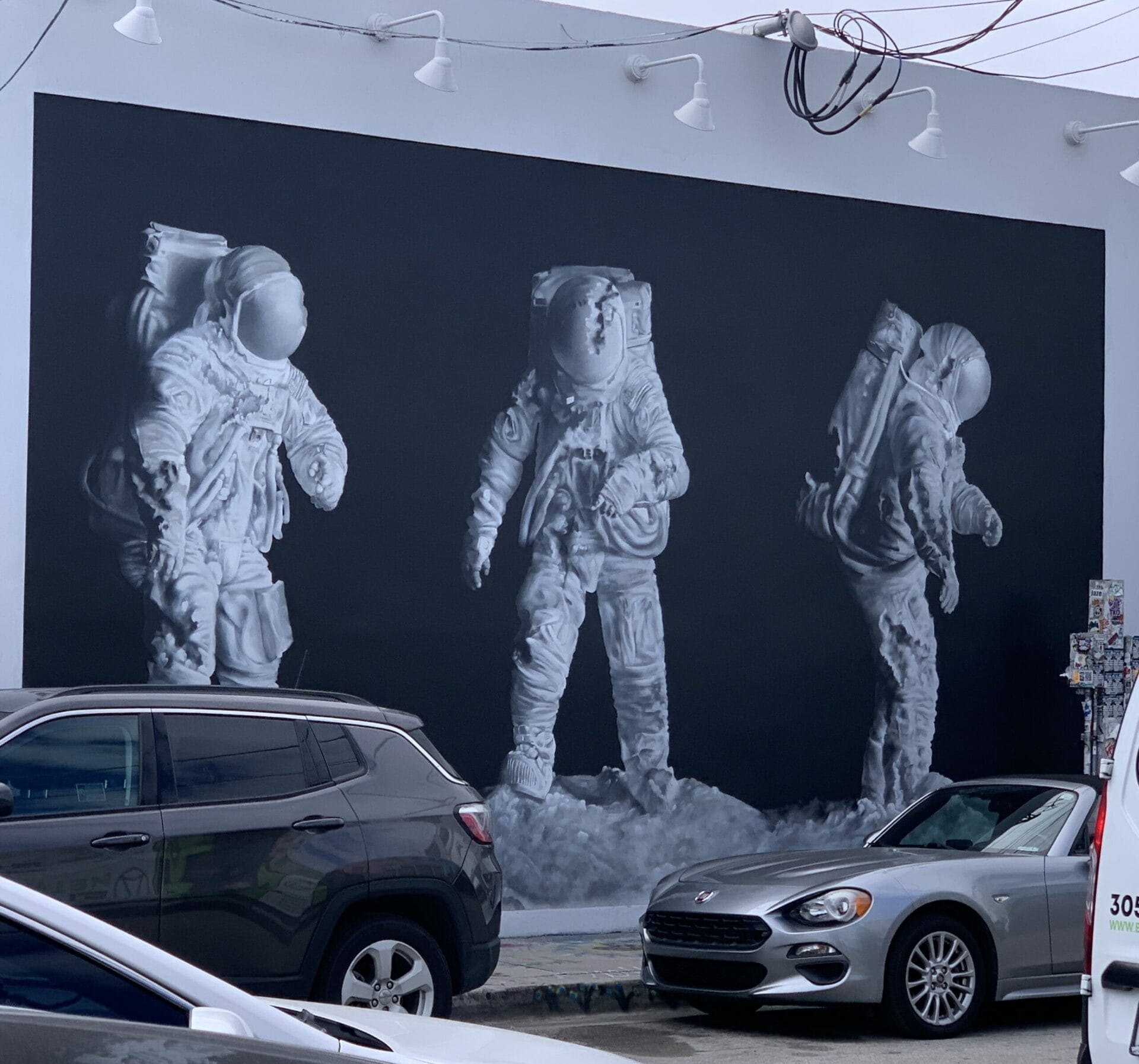 Vibrant street mural in Wynwood, Florida, showcasing colorful artwork on urban walls. Astronauts