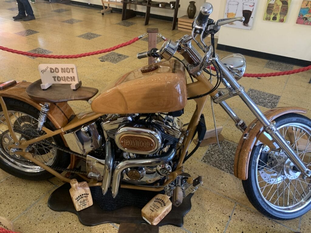 Woolworth Walk in Asheville, NC - wooden motorcycle by local artist on display