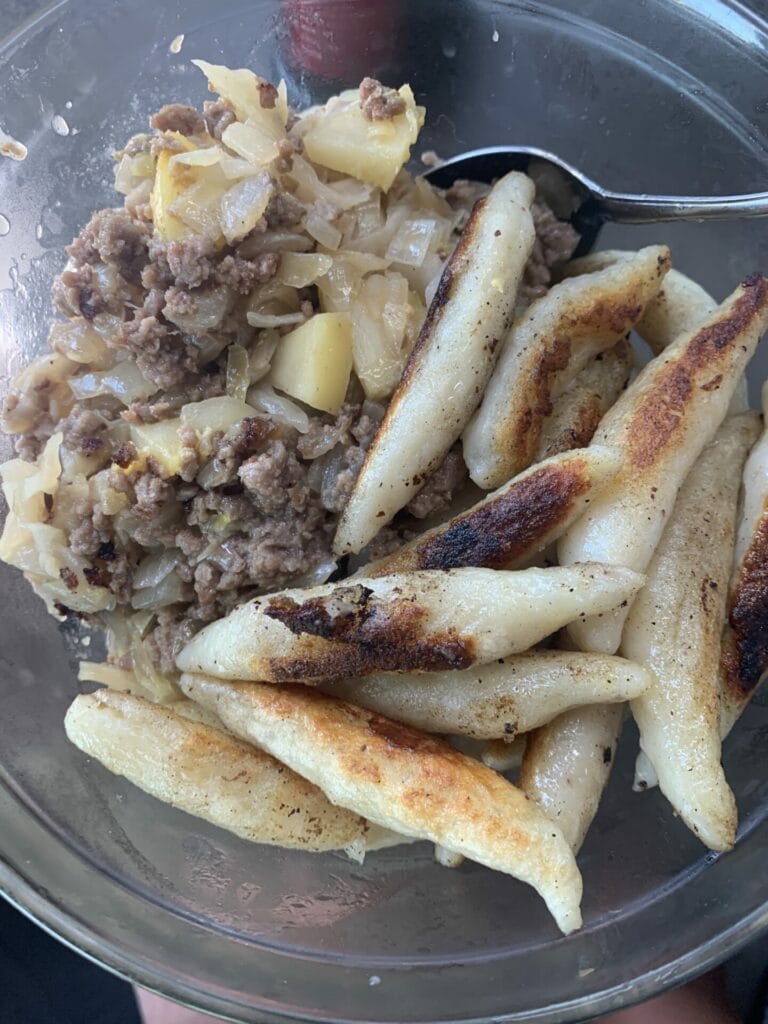 German sauerkraut with plant-based mince, served with schupfnudeln.