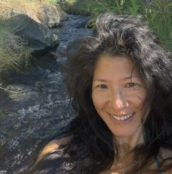 Lillian Lu soaking in the convenient, tranquil, and free Keough Hot Springs, a hot springs in Mammoth Lakes. A must-visit when in Bishop, CA.