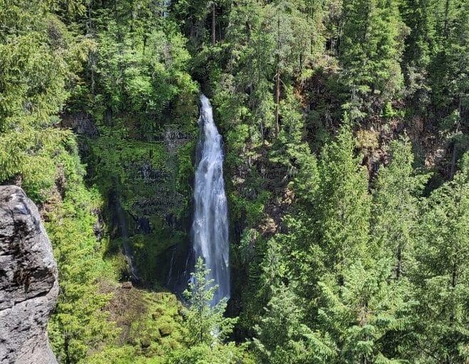 170 feet tall waterfall in Prospect, Oregon is stunning in the stunning forest and surrounded by boulders and is near Crater Lake.