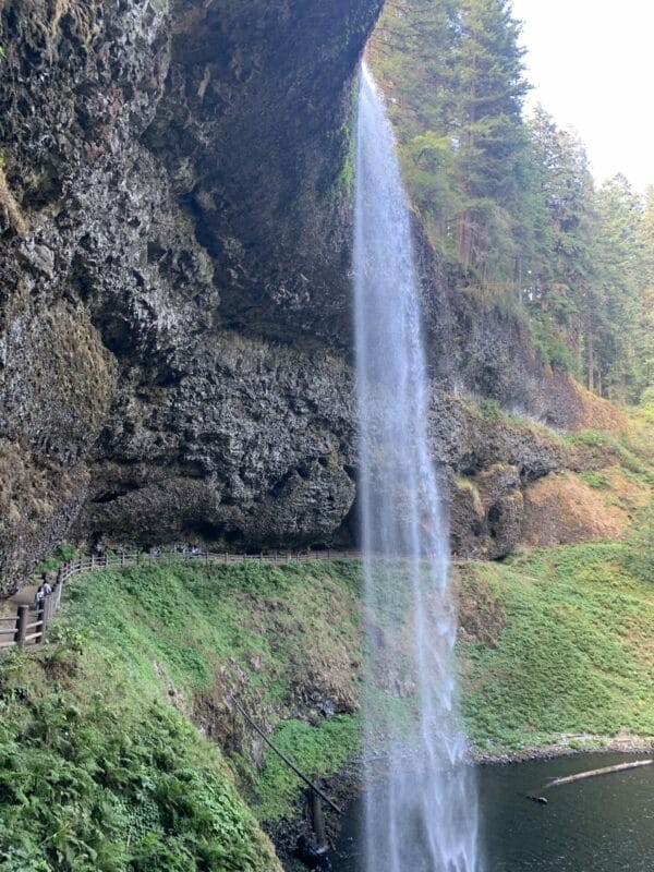 South Falls with the trail behind the waterfall in Silver Falls State Park.