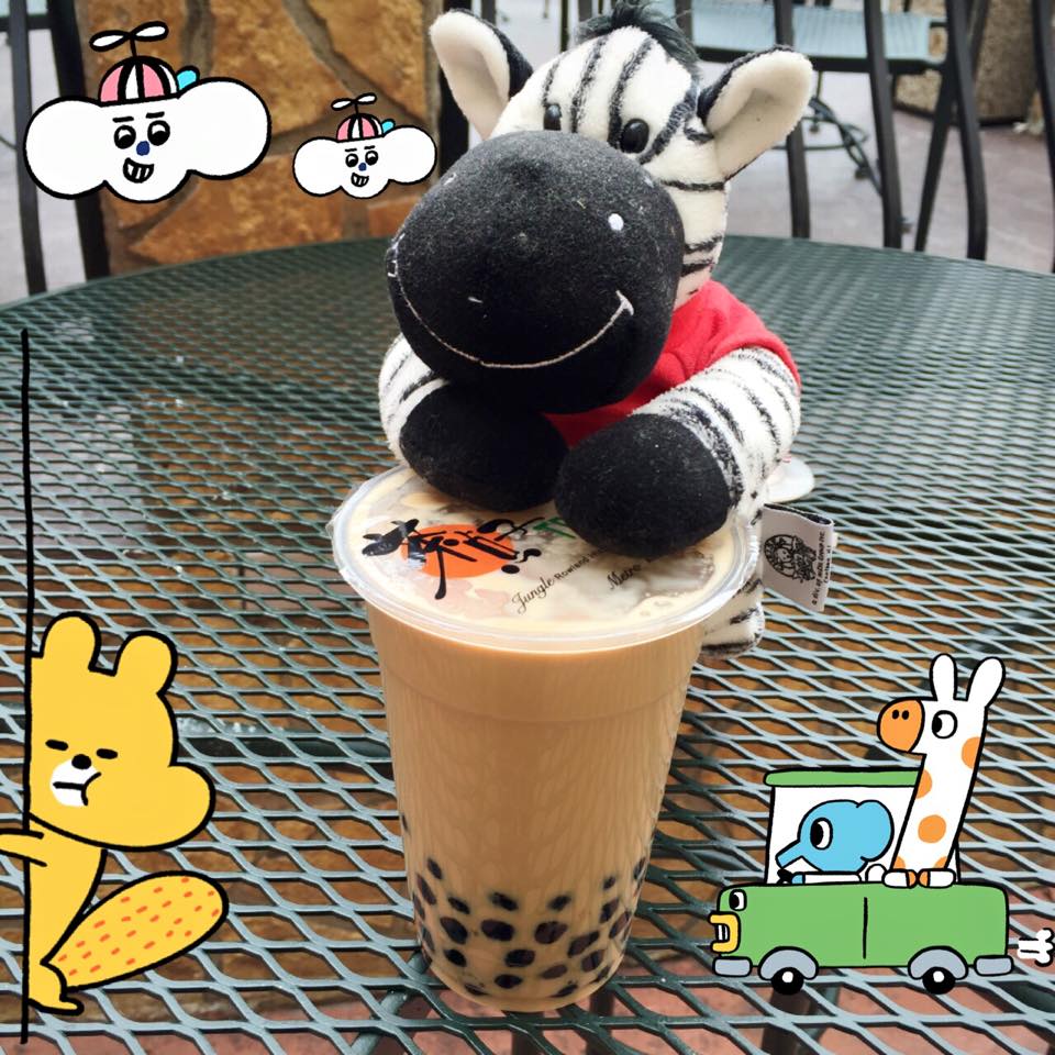 Picture of boba tea by Tea Bar in Rowland Heights with a stuff animal.