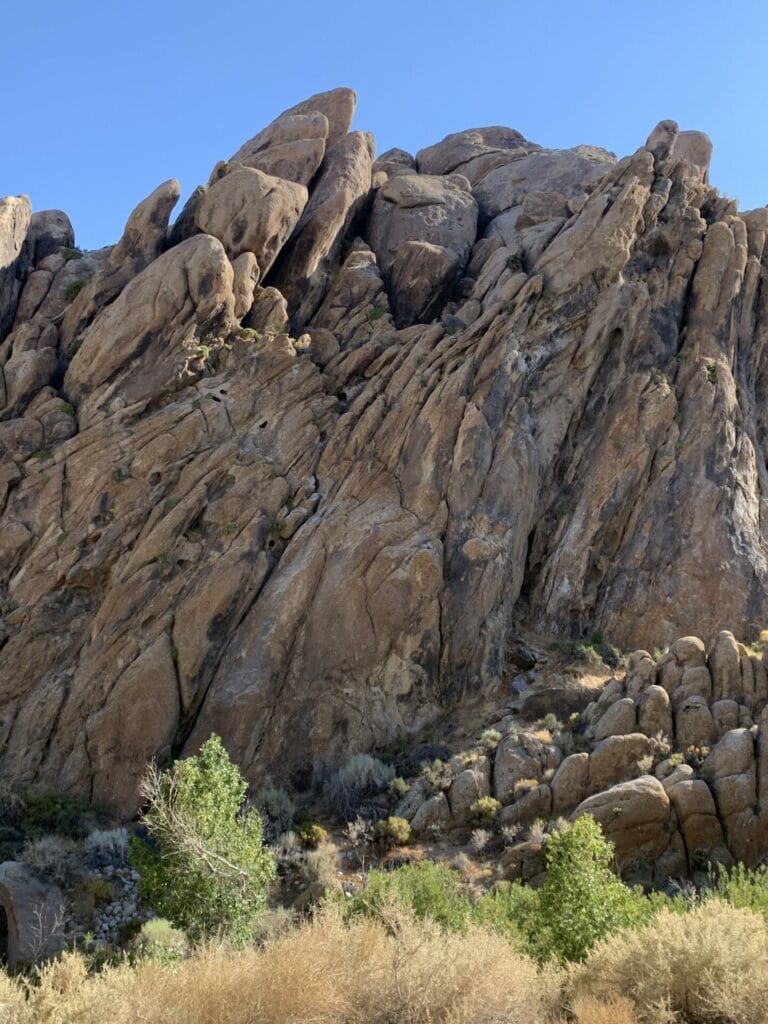 Rock formations that towers with a slight bend on the top, as if the wind has blown them away. Alabama Hills rock formations are unique and magnificent!