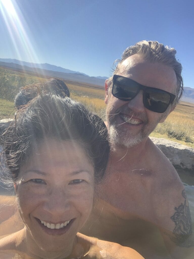 Lillian Lu and Theron Hayes enjoying hot springs in Mammoth Lakes area safely.