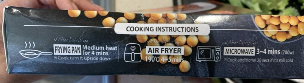 Cooking instructions on the packaging of Bobmoos vegan Korean Spicy Bulgogi showing pan fried, air-fryer, and microwave directions.