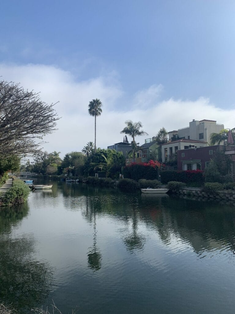 Venice Beach Canals with lush gardens and beautiful charming homes lined the water.