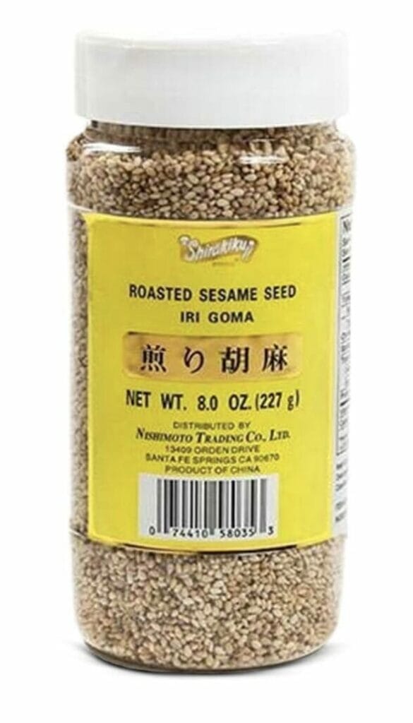 A jar of Korean toasted sesame seeds, ready to be used to top your dishes.