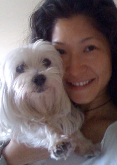 Author Lillian Lu with her Coco. Pet therapy is one of the unconventional stress relief techniques that you must try to de-stress.