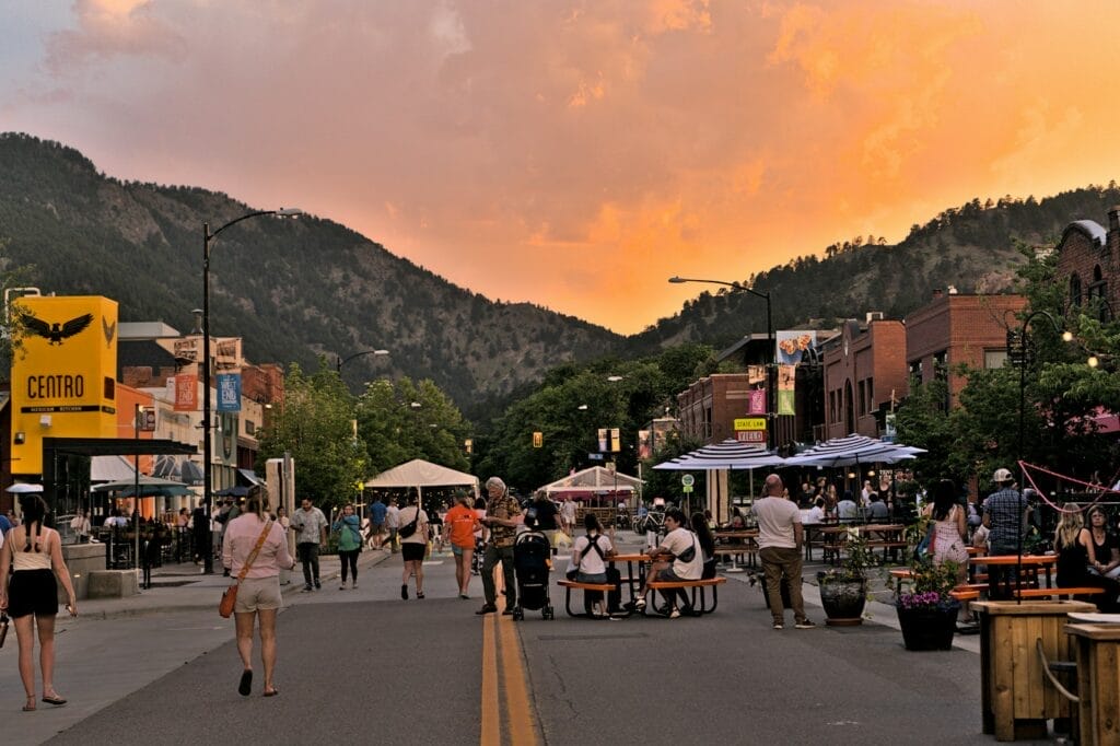 Sunsetting in Boulder, CO showing the mountains behind the town. It's a unique town to visit as a vegan vanlifer.