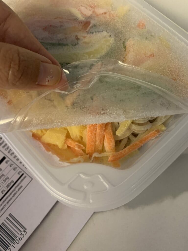 To microwave Trader Joe's Japchae for serving, make sure to open the plastic film on top so it can vent.